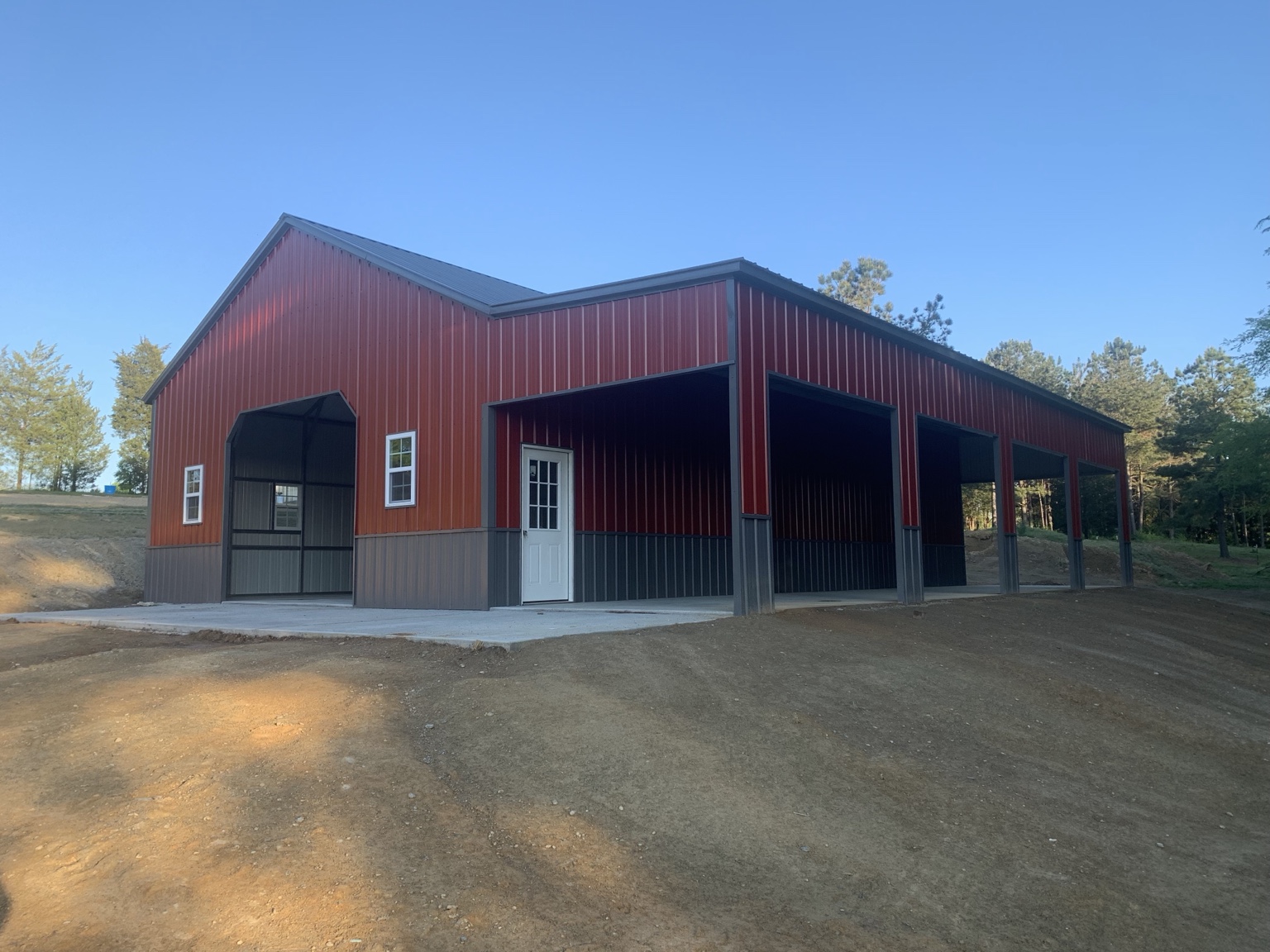 Red building with an attached open shelter