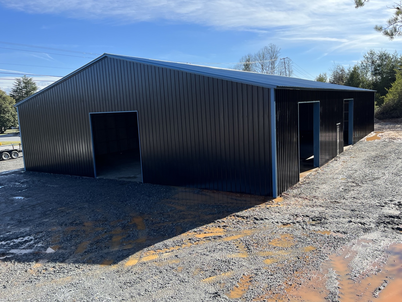 Black building with multiple framed openings