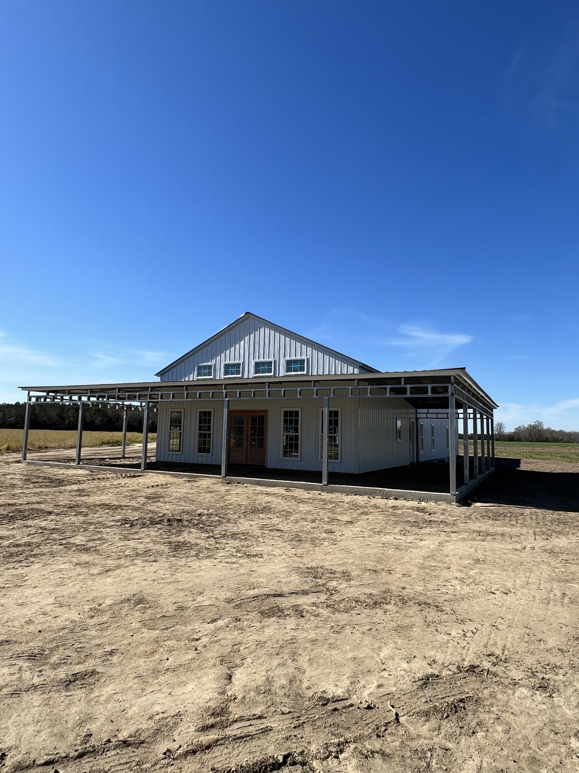 Building with a wraparound covered area