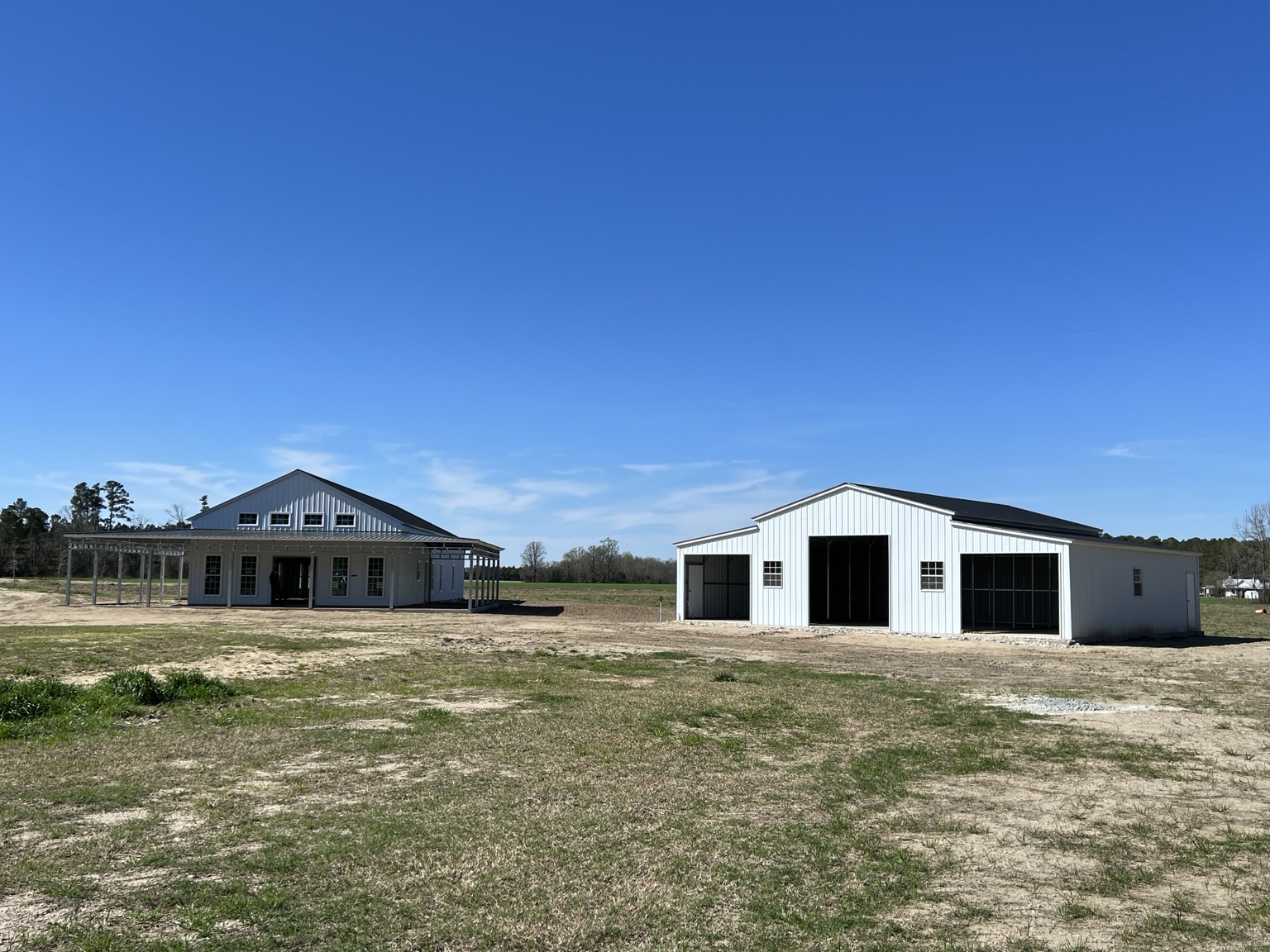 Two metal buildings with different rooflines