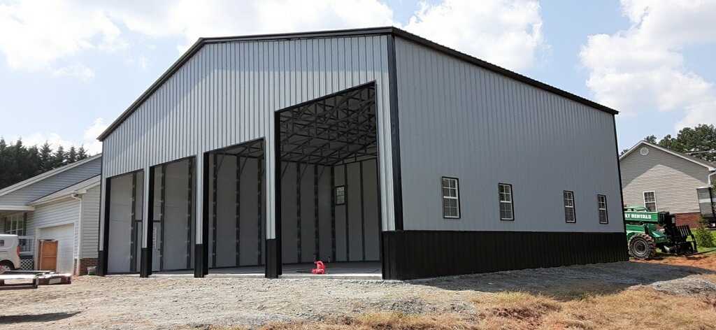 Tall metal building with multiple framed openings